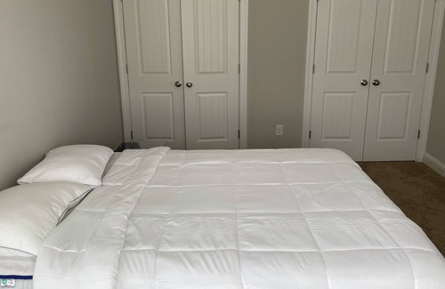 Fuquay-Varina House | Spacious Bedroom with Private Bathroom