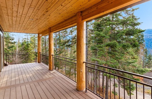 Bigfork Cabin | Spacious cabin overlooking Swan Lake with 2-story deck, fireplace & firepit