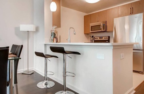 Hudson Exchange Apartment | Spacious & Clean 1BR | Work Desk & WiFi | by GLS
