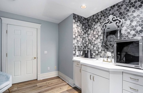 Harbor Springs Condo | Spacious condo with walkable location, onsite restaurant, & charming decor