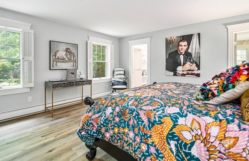 Harbor Springs Condo | Spacious condo with walkable location, onsite restaurant, & charming decor