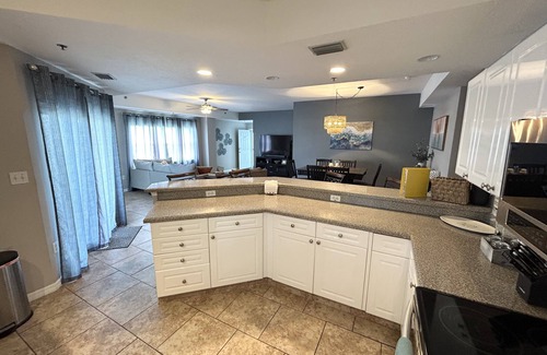 New Smyrna Beach Condo | Spacious Corner Unit Beach Condo with Nightly Sunsets Over the Nature Preserve