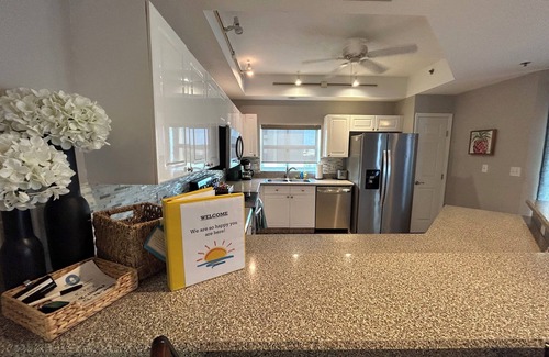 New Smyrna Beach Condo | Spacious Corner Unit Beach Condo with Nightly Sunsets Over the Nature Preserve