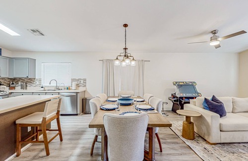 Canyon Ridge West House | Spacious desert home with hot tub, covered patio, grill, & modern finishes