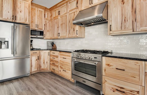 Sweetwater House | Spacious, Dog-Friendly Home with Shared Pool, WiFi, Huge Deck, & Gas Fireplace