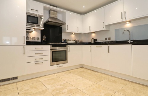 Padstow Apartment | Spacious dog friendly apartment by the beach, private garden and sea views.