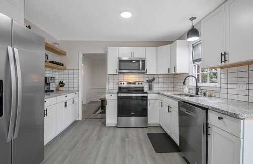 Terry Sanford House | Spacious Family Oasis with Hot Tub, PingPong, Air Hockey & More - Ideal Getaway!