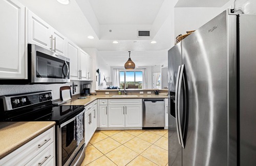 Inlet Villas Condo | Spacious Gated Minorca Retreat, Pet Friendly with Pond Views and Resort Amenities - MM403