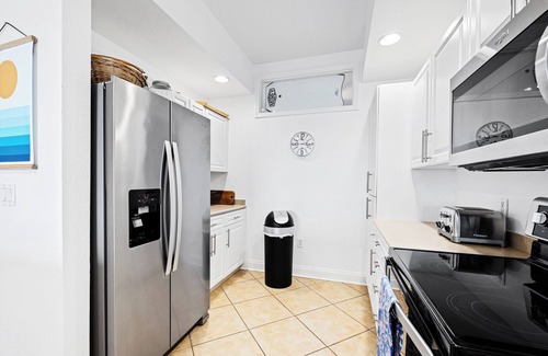 Inlet Villas Condo | Spacious Gated Minorca Retreat, Pet Friendly with Pond Views and Resort Amenities - MM403