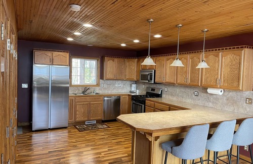 Manistee House | Spacious getaway nestled between two beautiful lakes!