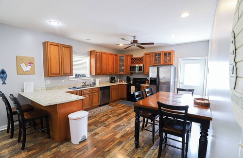 Gilbertsville House | Spacious Home in Moors Community on KY Lake with Outdoor Hot Tub and Fire Pit