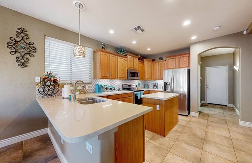 Glendale House | Spacious home surrounded by palms with pool, grill, children's items, & W/D