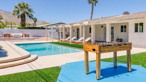 Racquet Club Estates Apartment | Spacious home with pool, fireplace, outdoor deck