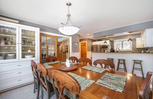 Maple City House | Spacious home with studio, lake access, sunroom, fireplace, W/D, & central AC