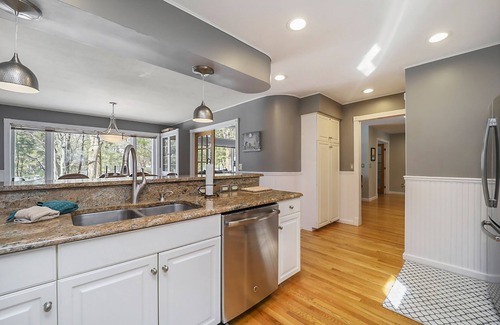 Maple City House | Spacious home with studio, lake access, sunroom, fireplace, W/D, & central AC