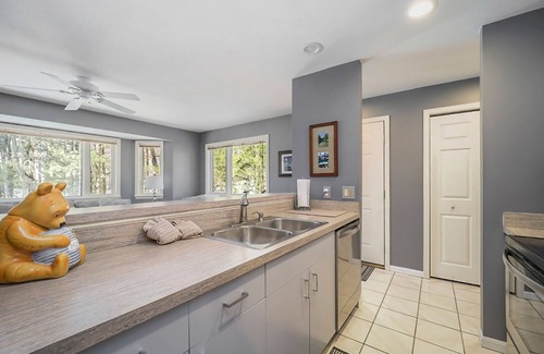 Maple City House | Spacious home with studio, lake access, sunroom, fireplace, W/D, & central AC