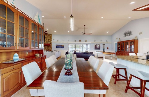 Lake Placid House | Spacious home with enclosed pool, private lake access, and game room.