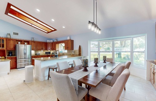 Lake Placid House | Spacious home with enclosed pool, private lake access, and game room.