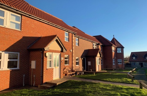 Bamburgh Apartment | Spacious & homely ground floor apartment in central village location near beach