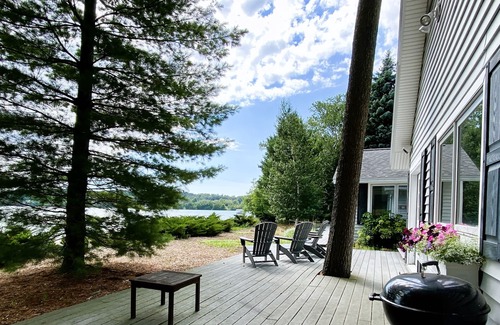 Leland House | Spacious house on Lake Leelanau with sandy beach and dock.