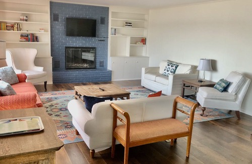 Leland House | Spacious house on Lake Leelanau with sandy beach and dock.