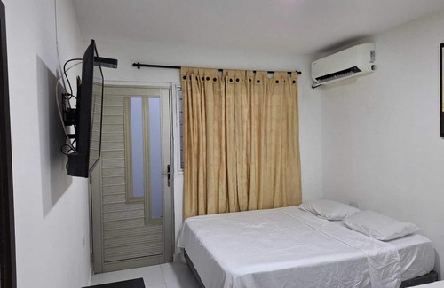 Urbanizacion Eliana House | Spacious independent room 2 blocks from the beach and airport