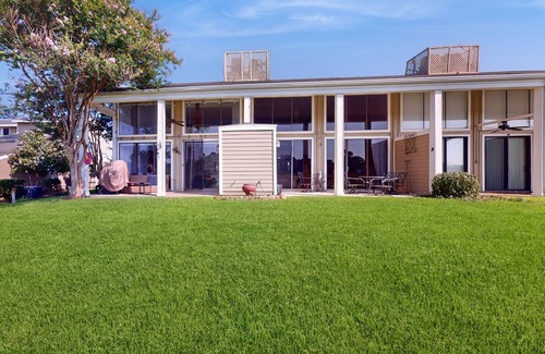April Sound Condo | Spacious Lake Front Condo, Fish Right Outside the Back Patio