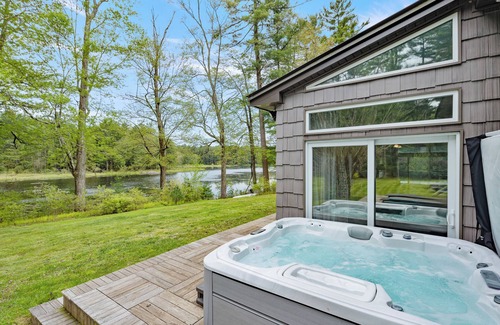 Forestburgh Villa | Spacious Lakefront Hideaway with Hot Tub & Kayaks