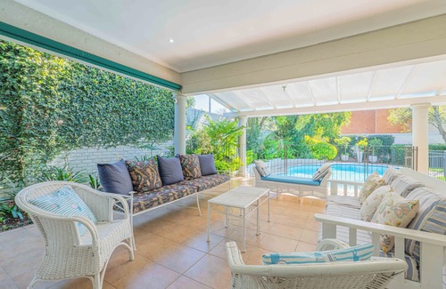 Greater Johannesburg Metropolitan Area House | Spacious Manor with Cozy Fireplace, Garden & Pool