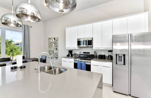 Reunion Hotel | Spacious Modern Condo with Pool Table, Rooftop Terrace and Large Loft. Reunion Resort Water Park Access near Disney at Spectrum Resort Orlando by Rentyl - B45 #237