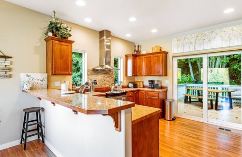 Port Angeles East House | Spacious ocean-view home with forest stream, hot tub, & private community beach