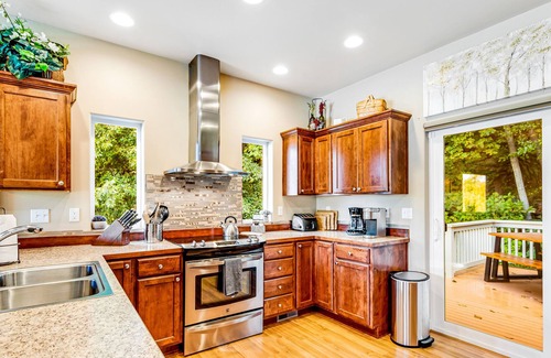 Port Angeles East House | Spacious ocean-view home with forest stream, hot tub, & private community beach
