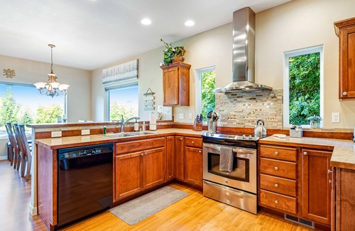 Port Angeles East House | Spacious ocean-view home with forest stream, hot tub, & private community beach