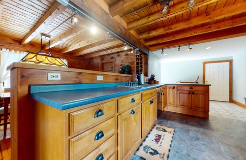Chester House | Spacious retreat with private hot tub, game room, deck, fireplace, & W/D