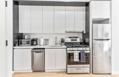Central Park South Apartment | Spacious Studio with Charming Juliet Balcony