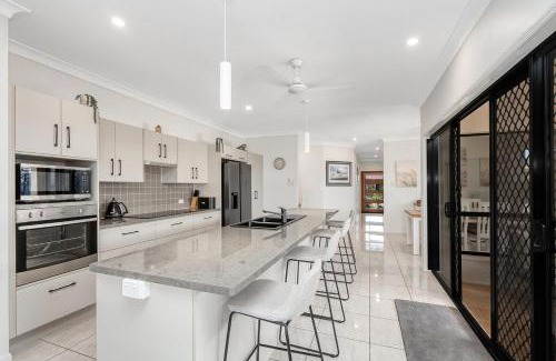 Burdell House | Spacious Townsville Retreat with Heated Pool