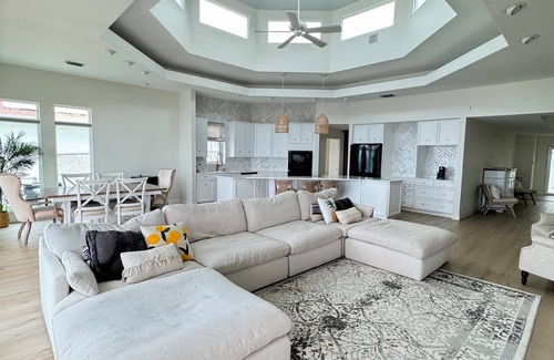 St. Petersburg House | Spacious Waterfront Tropical Oasis: Hot Tub, Dock & Turf