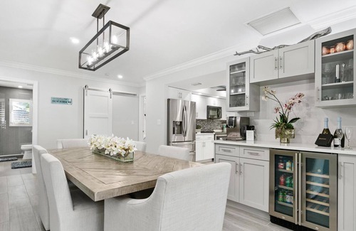 Naples Park House | Spared by Ian! Pool. Spa. Tiki! |Walk to Beach|Nina's Tiki Beach House