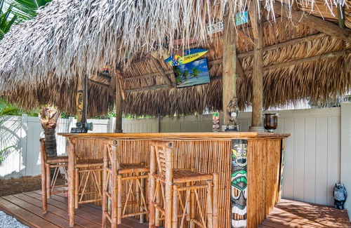 Naples Park House | Spared by Ian! Pool. Spa. Tiki! |Walk to Beach|Nina's Tiki Beach House
