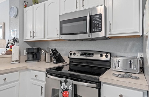 Windsor Hills House | Special °o° Luxury Townhome w/Mickey décor with heated Pool.