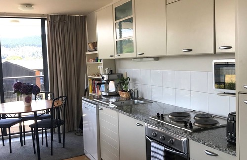Whangamata Apartment | Spectacular Apartment with Spa pool, Heated Swimming pool, Private Decks & more!