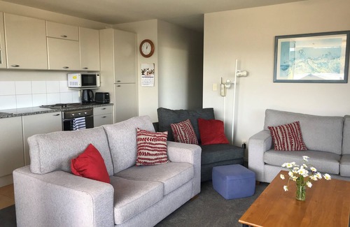 Whangamata Apartment | Spectacular Apartment with Spa pool, Heated Swimming pool, Private Decks & more!