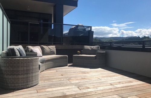 Whangamata Apartment | Spectacular Apartment with Spa pool, Heated Swimming pool, Private Decks & more!
