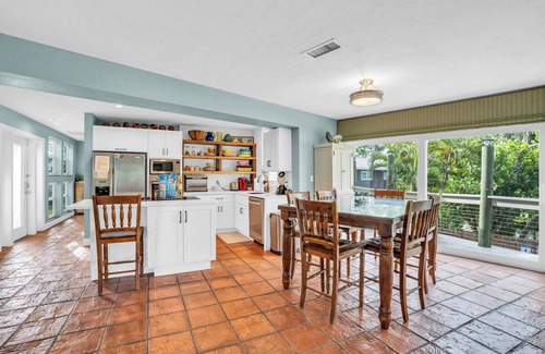 Mid Island House | spectacular architectural home steps to the beach w/private heated pool on canal