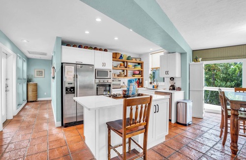 Mid Island House | spectacular architectural home steps to the beach w/private heated pool on canal