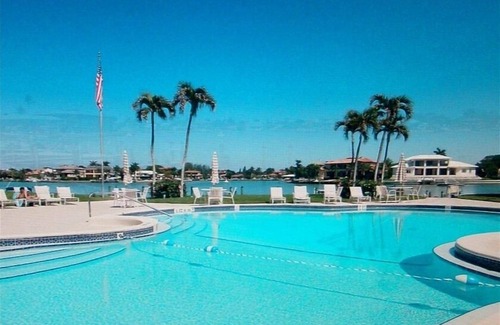 Moorings Condo | Spectacular Bay View In Moorings/Park Shore Three Month Min.