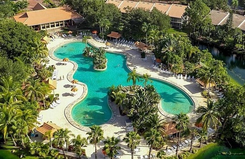 Naples Condo | SPECTACULAR LAKE VIEW FROM CONDO Resort style pool DEC & JAN available