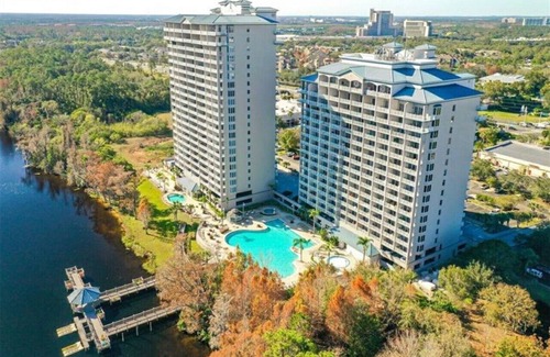 Florida Central Atlantic Coast Condo | Spectacular Lakefront Condo at Disney's Doorstep - just 1 mi. to Disney Springs!