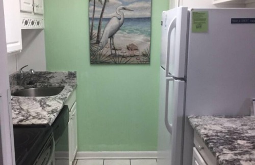 Northeast Virginia Beach Condo | Spectacular oceanfront at quiet end of boardwalk at Rudee Inlet SEE SPECIALS.