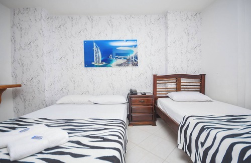 Estadio Hotel | Spectacular triple room with air, wifi and hot water in Laureles-Estadio-Medellin